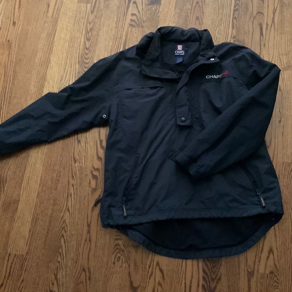 NWT. Mens navy pullover shell. Excellent cony as was never used.